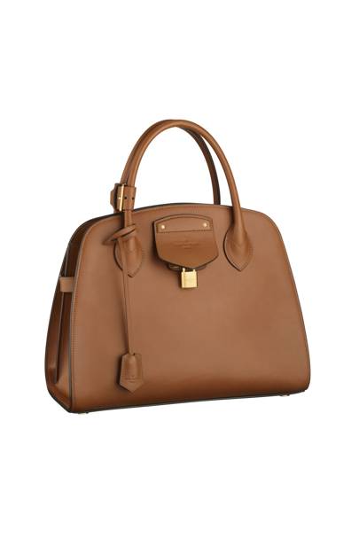 Louis Vuitton Bespoke Handbag Service Haute Maroquinerie British The Neo Steamer Vuitton Calls This An Exception To Rules Of Geometry And Like Others In Collection It Bears A Branded Padlock