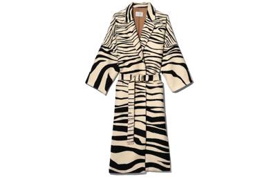 10. The animal-print trench