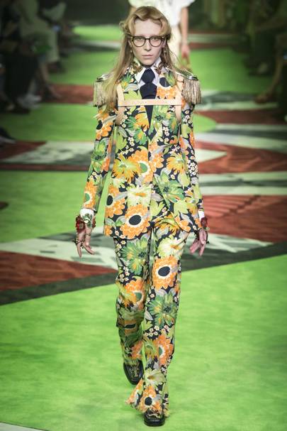 At the Gucci Spring/Summer 2017 show, many models wore clothes in the Greenery color while walking down a Greenery-colored runway.